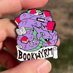 "Bookwyrm" enamel pin